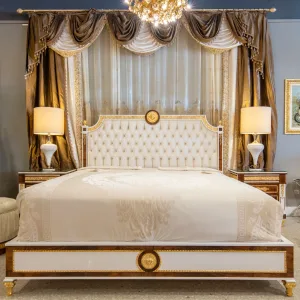 Luxurious solid wood bedroom featuring the Lucente Bedroom in Gilded Gold from a head on angle.