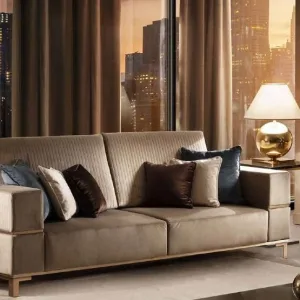 Essence modern Italian Living Room sofa with upholstered arms and end tables in a modern living room.